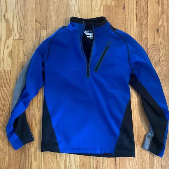 Obermeyer sz S black and blue half zip pullover zip pocket great pre owned cond